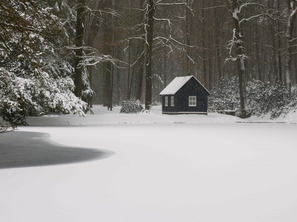 Huisje in de sneeuw