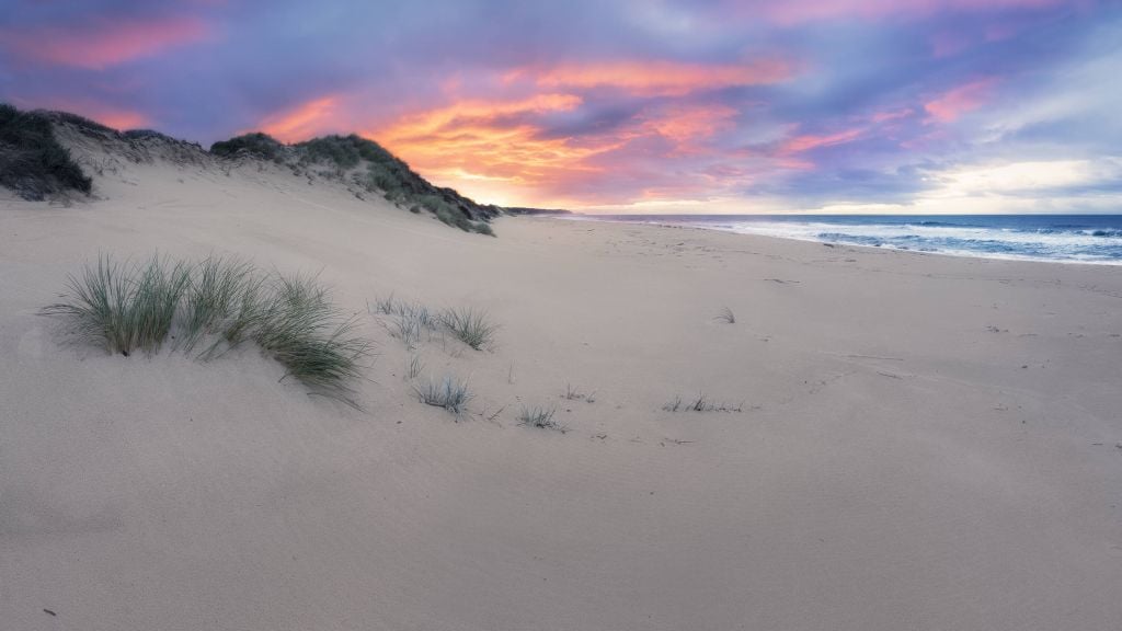 Zonsopgang over zandduinen