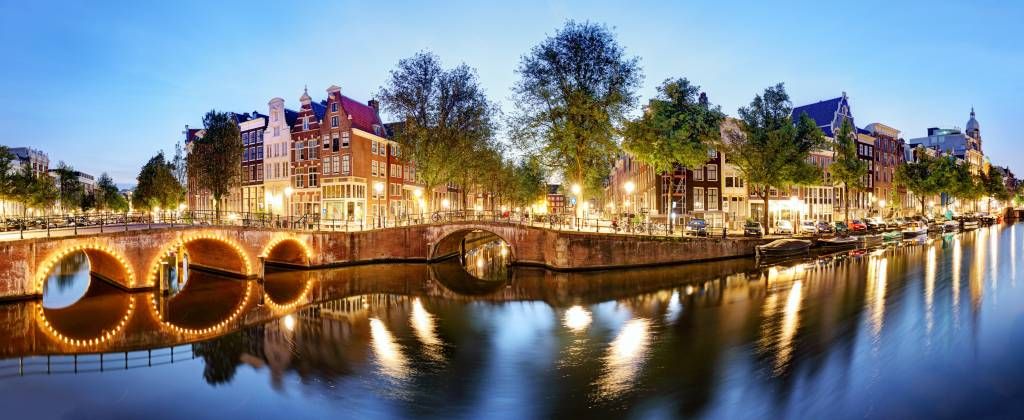 Steden behang - Amsterdam bij nacht - Woonkamer