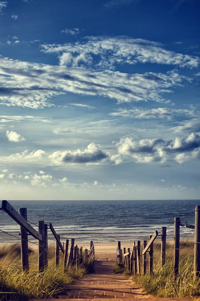 Strand en wolken main product photo