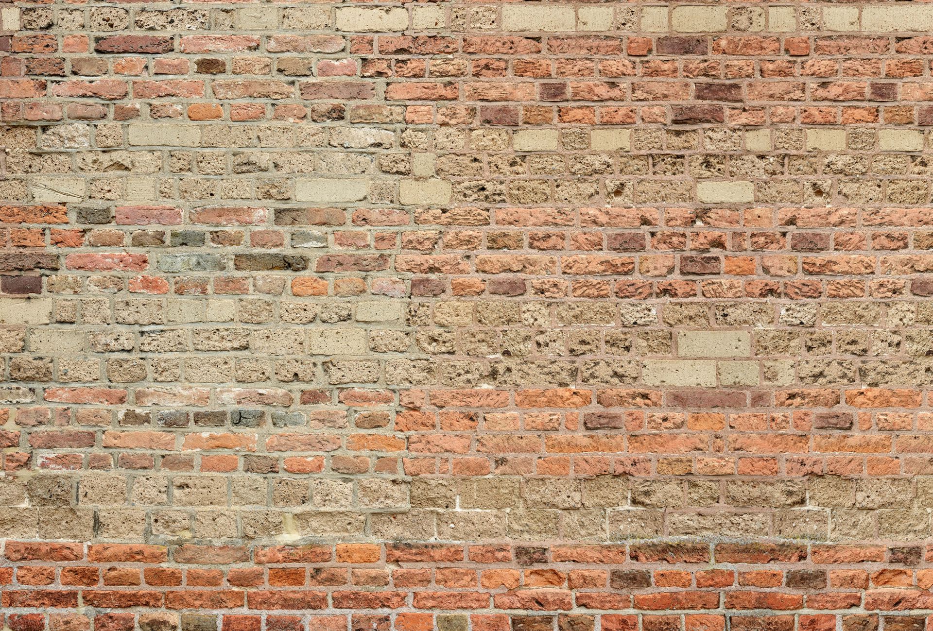 Muur met verschillende bakstenen main product photo